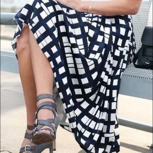 Knee length plaid skirt in navy and black